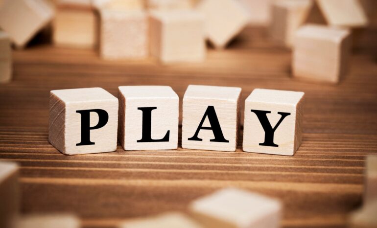 cubes spelling out PLAY
